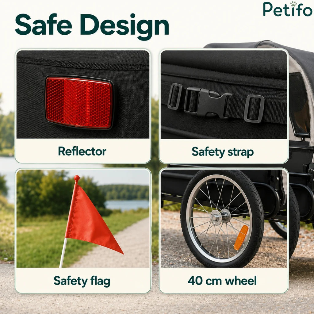 Safe design feature highlights including a rear red reflector, adjustable security strap, high-visibility orange flag, and a large 40 cm wheel.