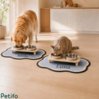 Golden retriever and cat enjoying a meal from personalized wooden raised pet feeders on custom name mats in a modern kitchen.