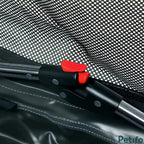 Close-up of the durable frame locking mechanism featuring a bright red release button for easy folding.