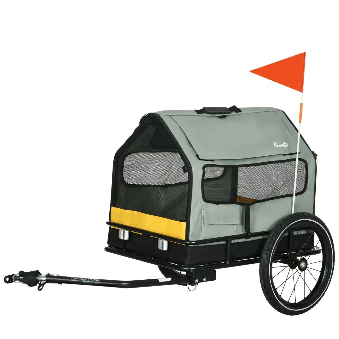 Clean studio profile shot of the grey and yellow pet bike trailer fully assembled with the tow bar and safety flag attached.