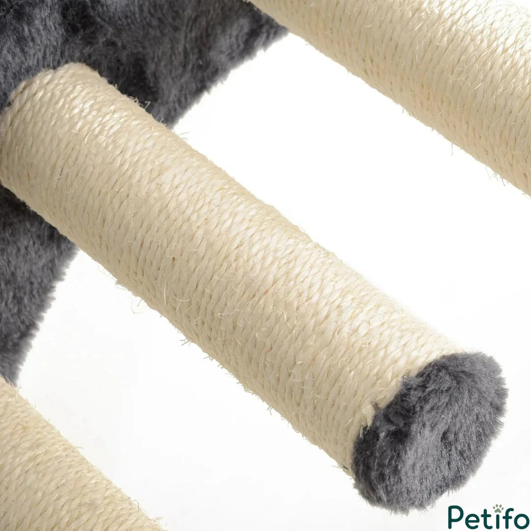 Detailed macro shot of natural sisal rope wrapped securely around the wooden scratching steps of a wall-mounted cat climbing set.