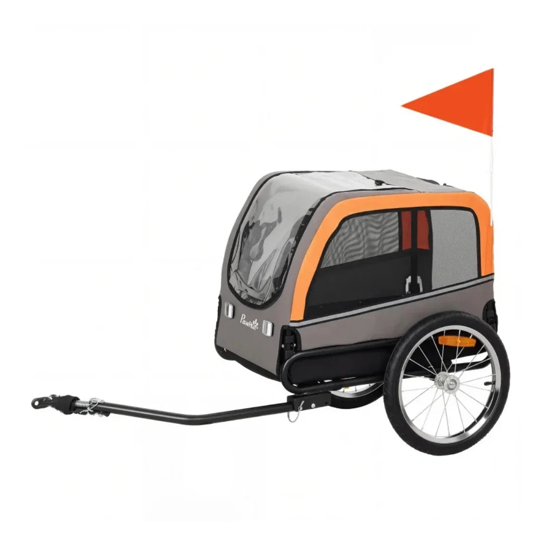 Empty grey and orange bicycle pet trailer with mesh windows, protective clear rain cover, tow bar, and high-visibility safety flag.