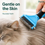 Close-up of the Petifo deshedding comb featuring rounded teeth that are gentle on the skin while brushing a relaxed cat.