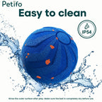 A textured blue pet ball surrounded by splashing water to highlight its IP54 water-resistant and easy-to-clean design.