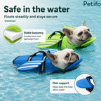 White and blue dog life jackets floating in water with foam layer cutaway and chin support highlights.