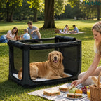 Golden Retriever resting comfortably inside a portable outdoor dog playpen during a family park picnic.