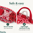 Close-up view of the secure plastic release buckle and durable aluminum D-ring on the vibrant red floral pet vest.