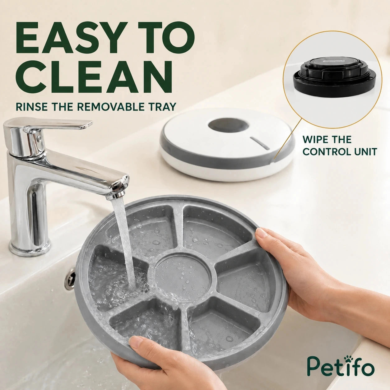 PawHut 6-meal pet feeder: Removable six-compartment food tray being rinsed clean - Petifo