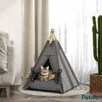 PawHut teepee pet bed: Cat resting in the grey teepee bed beside a sofa - Petifo